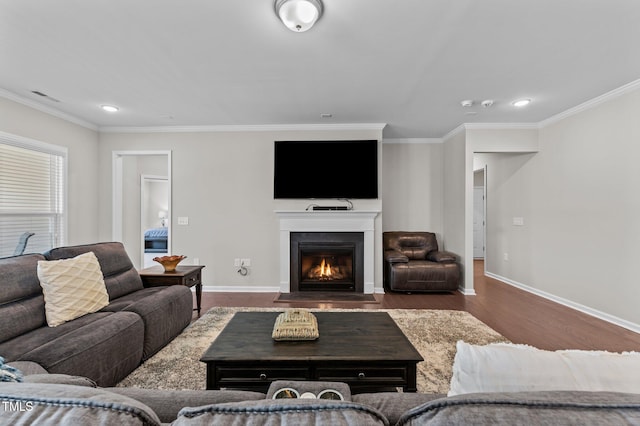 1112 Monterey Bay Dr, Wake Forest, NC 27587 - living room with wood finished floors, a fireplace with flush hearth, ornamental molding, baseboards, and recessed lighting