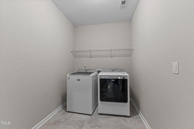 1112 Monterey Bay Dr, Wake Forest, NC 27587 - washroom with washer and dryer and baseboards
