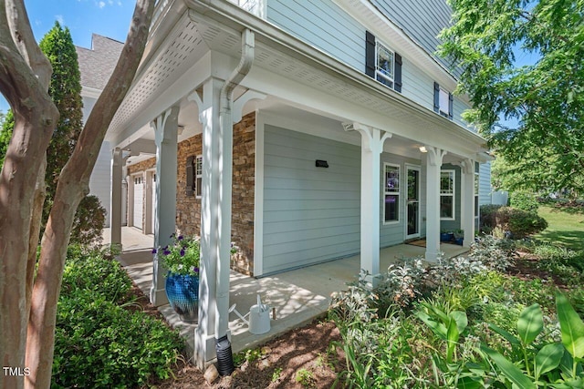3002 Bartlett Cir, Hillsborough, NC 27278 - view of side of home with covered porch and stone siding