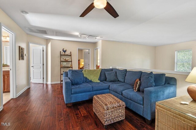 3002 Bartlett Cir, Hillsborough, NC 27278 - living room with dark wood-type flooring, a ceiling fan, and baseboards
