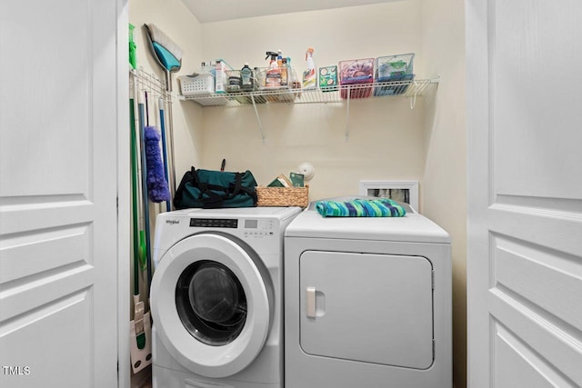 3002 Bartlett Cir, Hillsborough, NC 27278 - laundry area featuring washing machine and clothes dryer