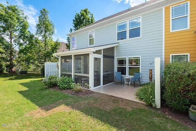 3002 Bartlett Cir, Hillsborough, NC 27278 - rear view of house featuring a sunroom, a patio area, and a lawn