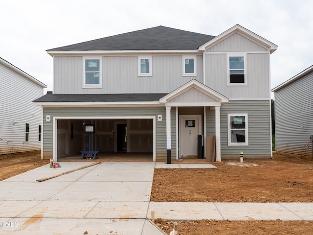 2242 Cherry Creek Rd, Haw River, NC 27258 - view of front of house featuring a garage and concrete driveway