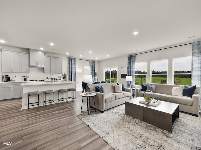 2242 Cherry Creek Rd, Haw River, NC 27258 - living room with recessed lighting and light wood-style floors