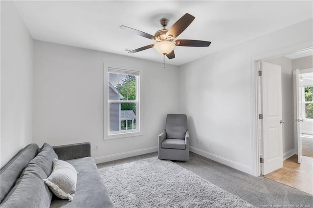 607 Rempstone Ln, Fayetteville, NC 28311 - living area featuring ceiling fan, baseboards, and carpet flooring