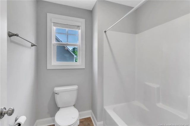 607 Rempstone Ln, Fayetteville, NC 28311 - full bathroom with baseboards, toilet, and shower / bath combination