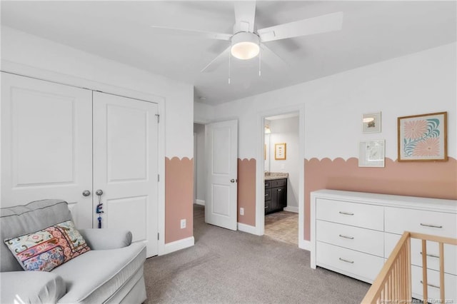 607 Rempstone Ln, Fayetteville, NC 28311 - carpeted bedroom with a closet, baseboards, a ceiling fan, and ensuite bath