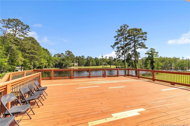 607 Rempstone Ln, Fayetteville, NC 28311 - wooden deck with view of wooded area and a water view