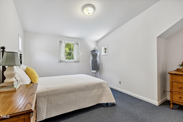 1304 N Duke St, Durham, NC 27701 - bedroom featuring dark colored carpet and baseboards