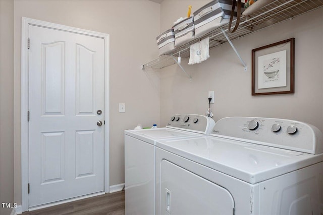 6512 Blalock Forest Dr, Willow Springs, NC 27592 - laundry room with washer and clothes dryer and dark wood-style flooring