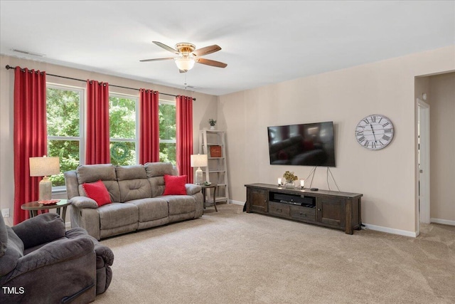 6512 Blalock Forest Dr, Willow Springs, NC 27592 - living room with ceiling fan, carpet flooring, and plenty of natural light
