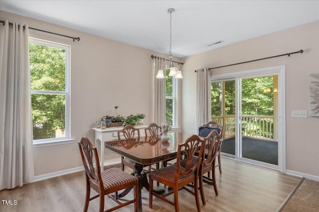 6512 Blalock Forest Dr, Willow Springs, NC 27592 - dining area with light wood finished floors and healthy amount of natural light