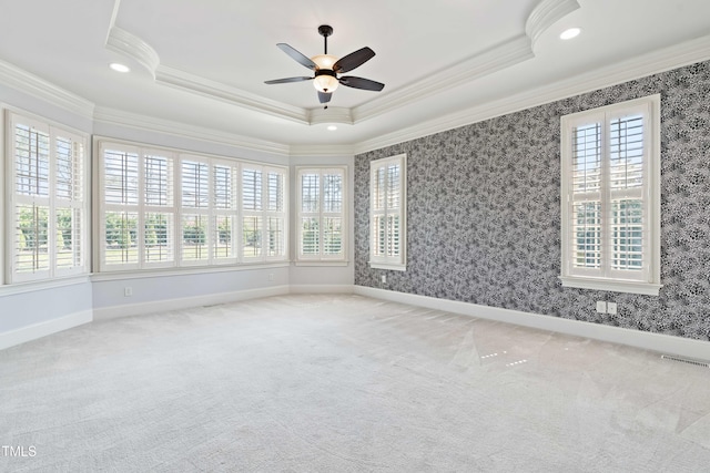 3908 Chaumont Dr, Apex, NC 27539 - carpeted spare room featuring crown molding, a ceiling fan, a raised ceiling, baseboards, and recessed lighting