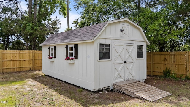314 Wrenn St, Apex, NC 27502 - view of shed with a fenced backyard