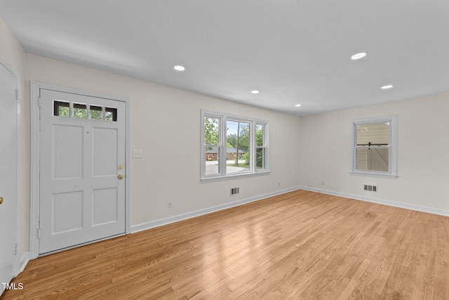 314 Wrenn St, Apex, NC 27502 - entryway featuring light wood-style flooring, baseboards, and recessed lighting