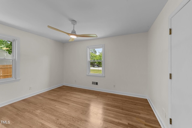 314 Wrenn St, Apex, NC 27502 - unfurnished room with light wood-type flooring, baseboards, and a ceiling fan