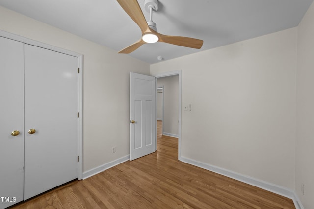 314 Wrenn St, Apex, NC 27502 - unfurnished bedroom with wood finished floors, baseboards, and ceiling fan