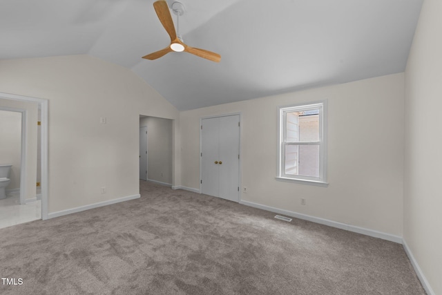 314 Wrenn St, Apex, NC 27502 - unfurnished bedroom with lofted ceiling, ensuite bathroom, carpet, baseboards, and ceiling fan