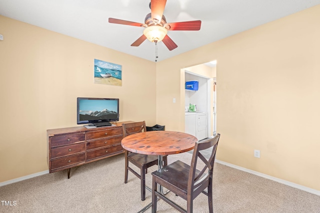 5312 Suntan Lake Dr, Raleigh, NC 27610 - dining area featuring independent washer and dryer, light carpet, a ceiling fan, and baseboards