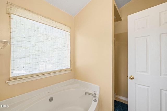 5312 Suntan Lake Dr, Raleigh, NC 27610 - bathroom featuring a bath