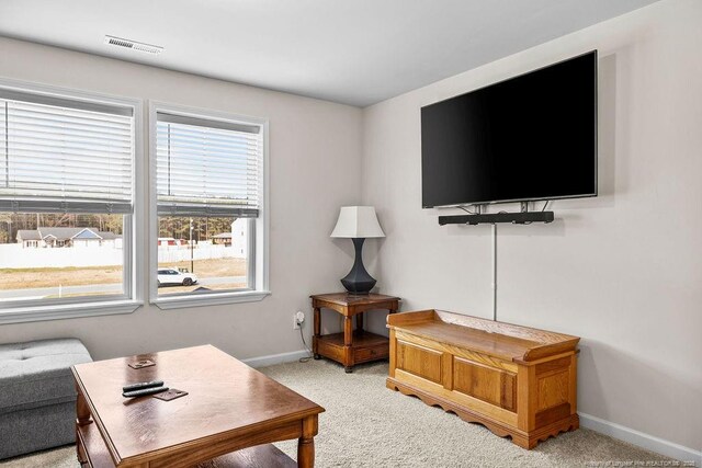 34 Merlin Ct, Godwin, NC 28344 - living area with baseboards, light carpet, and an office area