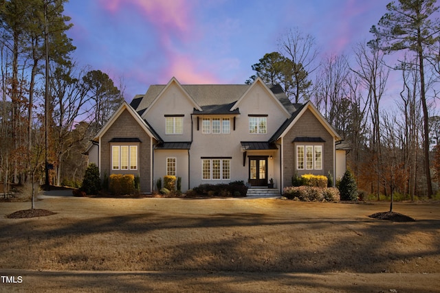 7212 Summer Tanager Trl, Raleigh, NC 27614 - view of front of home with french doors, a standing seam roof, and a metal roof