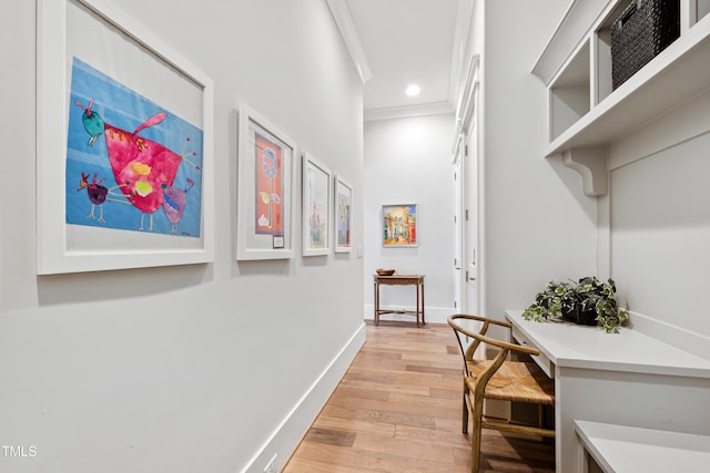 7212 Summer Tanager Trl, Raleigh, NC 27614 - hall with light wood finished floors, crown molding, and recessed lighting