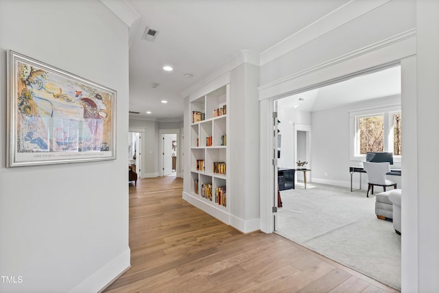 7212 Summer Tanager Trl, Raleigh, NC 27614 - hall with wood finished floors, recessed lighting, and ornamental molding