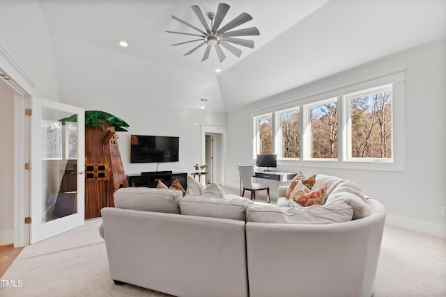 7212 Summer Tanager Trl, Raleigh, NC 27614 - living room featuring vaulted ceiling, ceiling fan, light colored carpet, and recessed lighting