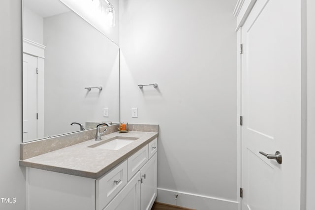 7212 Summer Tanager Trl, Raleigh, NC 27614 - bathroom with vanity and baseboards