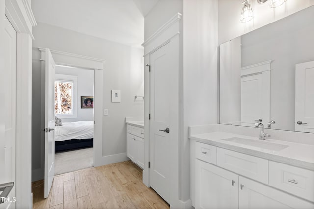 7212 Summer Tanager Trl, Raleigh, NC 27614 - ensuite bathroom featuring vanity and wood finished floors