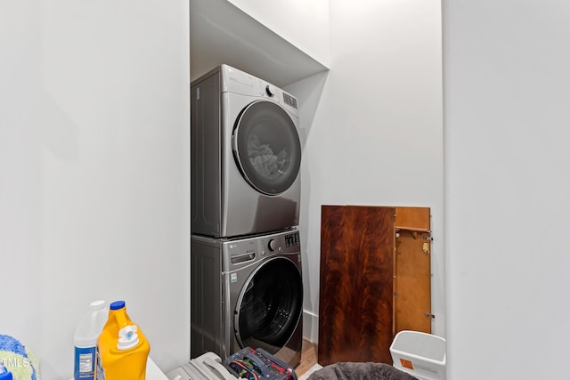 7212 Summer Tanager Trl, Raleigh, NC 27614 - laundry area with stacked washer and clothes dryer