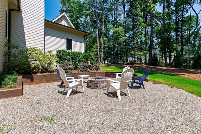 7212 Summer Tanager Trl, Raleigh, NC 27614 - view of patio featuring a fire pit