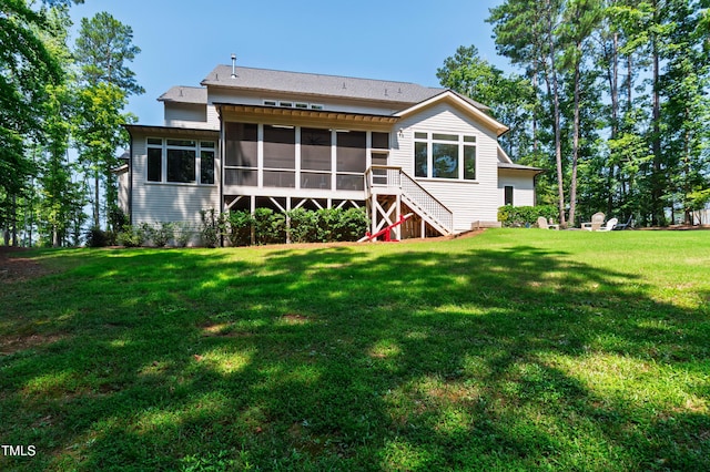 7212 Summer Tanager Trl, Raleigh, NC 27614 - back of house with a sunroom and a yard