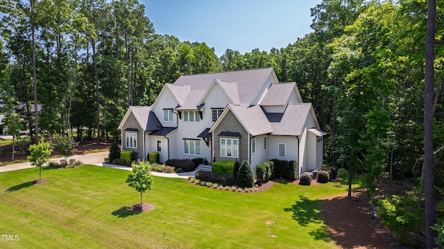 7212 Summer Tanager Trl, Raleigh, NC 27614 - craftsman house with a front lawn and roof with shingles
