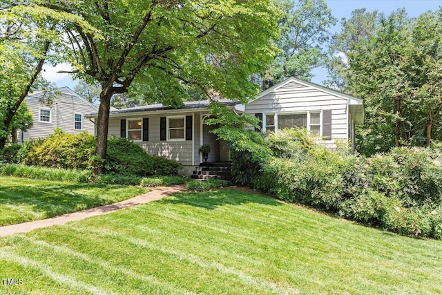2913 Anderson Dr, Raleigh, NC 27608 - view of front of home featuring a front yard