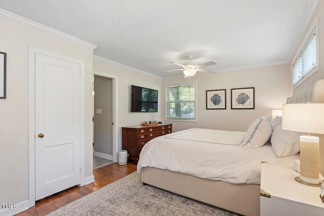 2913 Anderson Dr, Raleigh, NC 27608 - bedroom with wood finished floors, ornamental molding, baseboards, and a ceiling fan