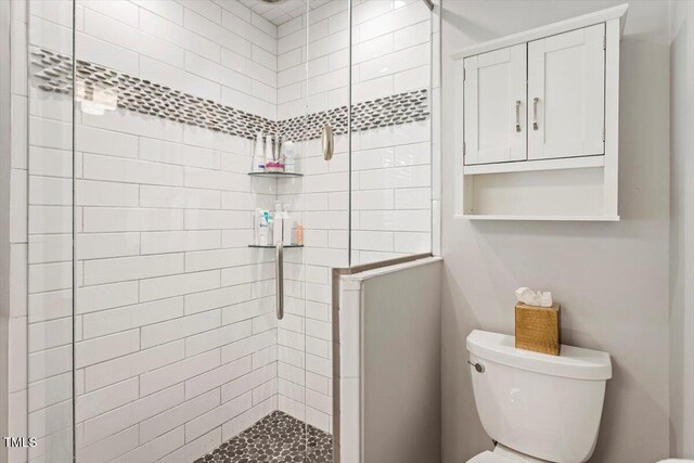 2913 Anderson Dr, Raleigh, NC 27608 - full bathroom featuring toilet and tiled shower