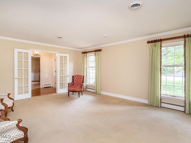 2228 Walker Ave, Burlington, NC 27215 - sitting room with a baseboard radiator, crown molding, french doors, and healthy amount of natural light