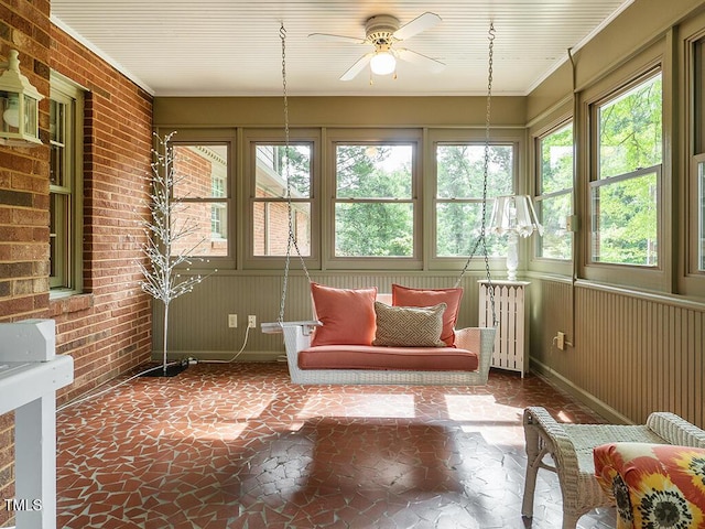 2228 Walker Ave, Burlington, NC 27215 - sunroom featuring brick wall and ornamental molding