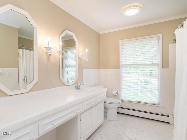 2228 Walker Ave, Burlington, NC 27215 - full bath with a baseboard radiator, tile walls, healthy amount of natural light, toilet, and wainscoting
