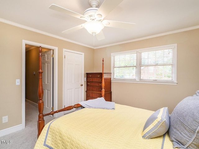 2228 Walker Ave, Burlington, NC 27215 - bedroom with carpet floors, crown molding, baseboards, and a ceiling fan