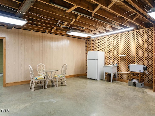 2228 Walker Ave, Burlington, NC 27215 - basement featuring freestanding refrigerator and a sink