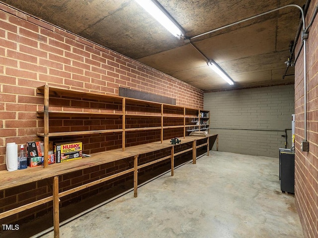 2228 Walker Ave, Burlington, NC 27215 - basement featuring brick wall