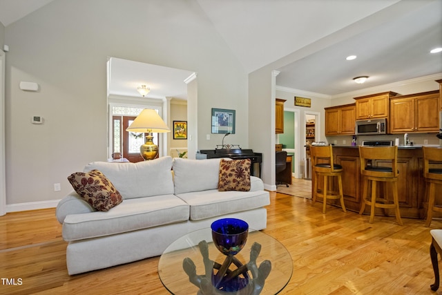 200 Daniel Ridge Ln, Roxboro, NC 27574 - living room featuring light wood-type flooring, high vaulted ceiling, crown molding, baseboards, and recessed lighting