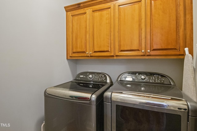 200 Daniel Ridge Ln, Roxboro, NC 27574 - laundry area featuring cabinet space and washer and clothes dryer