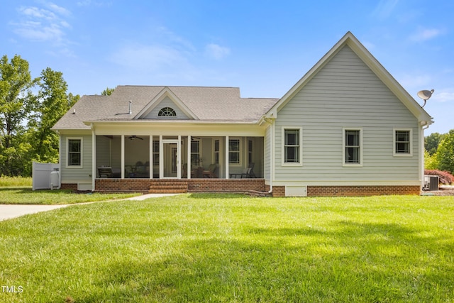 200 Daniel Ridge Ln, Roxboro, NC 27574 - back of house with a sunroom, a lawn, central AC unit, and a shingled roof