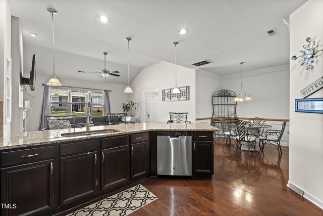 4612 Hanging Fern Ln, Raleigh, NC 27604 - kitchen featuring a sink, stainless steel dishwasher, dark wood-type flooring, light stone countertops, and vaulted ceiling