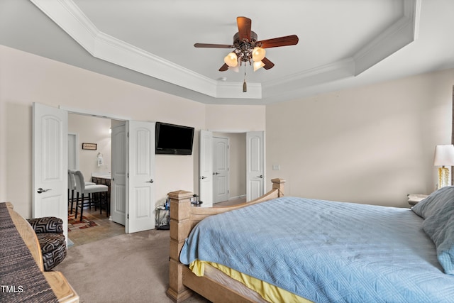 4612 Hanging Fern Ln, Raleigh, NC 27604 - bedroom featuring crown molding, a raised ceiling, light colored carpet, and a ceiling fan