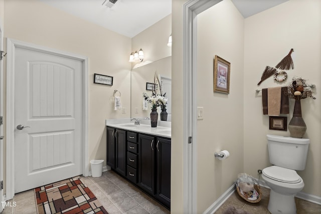 4612 Hanging Fern Ln, Raleigh, NC 27604 - full bath featuring toilet, double vanity, baseboards, and tile patterned floors